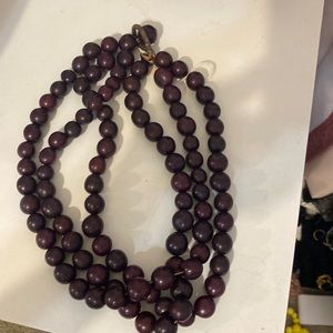Beautiful strand of ebony wood necklace.